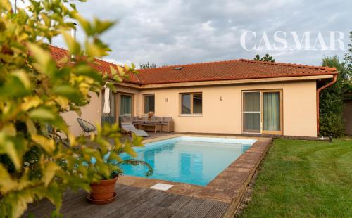 Na predaj priestranný 4-izbový rodinný dom v obci Tešedíkovo