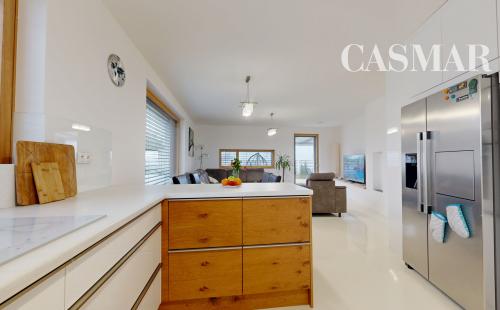 Luxusný 5izb pasívny RD s bazénom v obci Trstín–Malé Karpaty