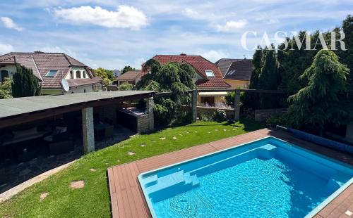 NOVÁ CENA! 2podlažný 6izb. rod.dom  s dvoj garážou    na Kozáckej ul.