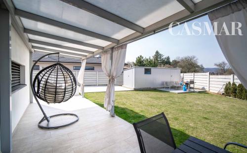 Luxusný 5izb pasívny RD s bazénom v obci Trstín–Malé Karpaty