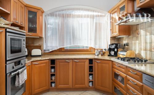 NOVÁ CENA! 2podlažný 6izb. rod.dom  s dvoj garážou    na Kozáckej ul.