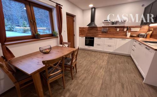 Na predaj/ Apartmánová Chata Tichá – výnimočná investičná príležitosť v Oščadnici